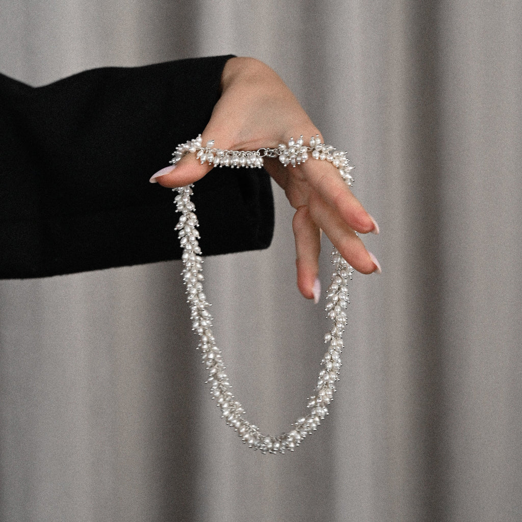 tiny white freshwater pearl sterling silver conceptual necklace