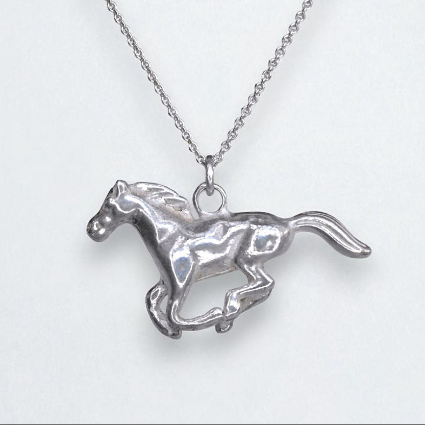 Silver horse pendant on a chain against a white background
