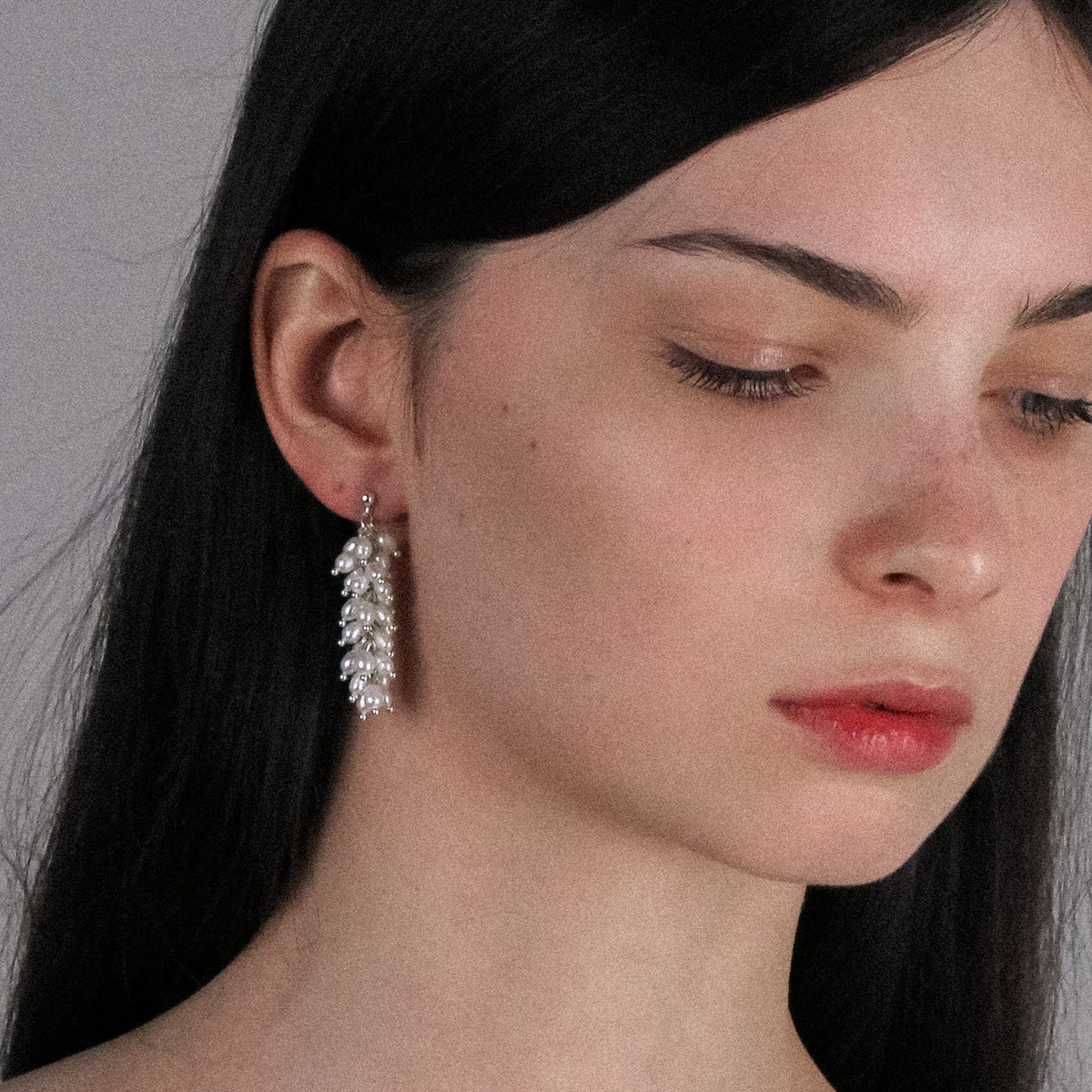 Lupine silver earrings featuring natural pearls