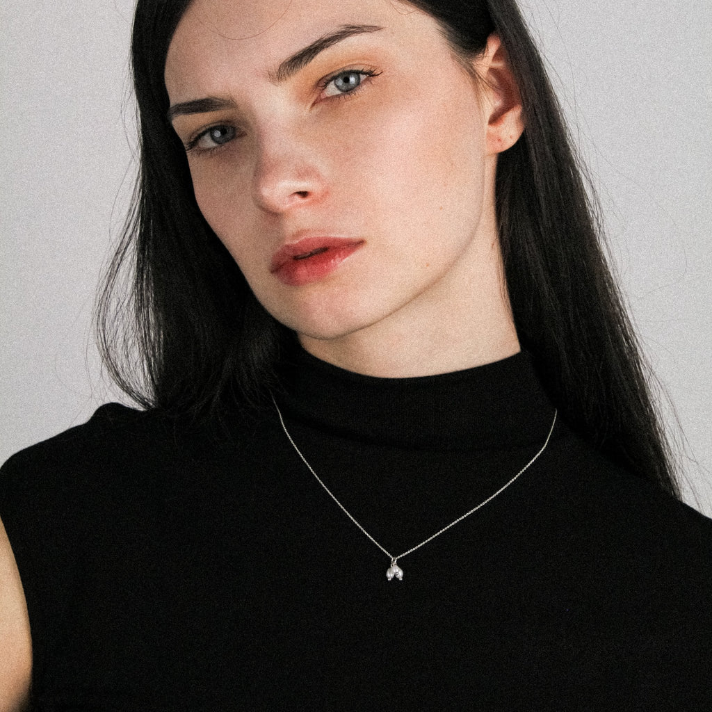 Lupine handmade silver necklace featuring natural pearls