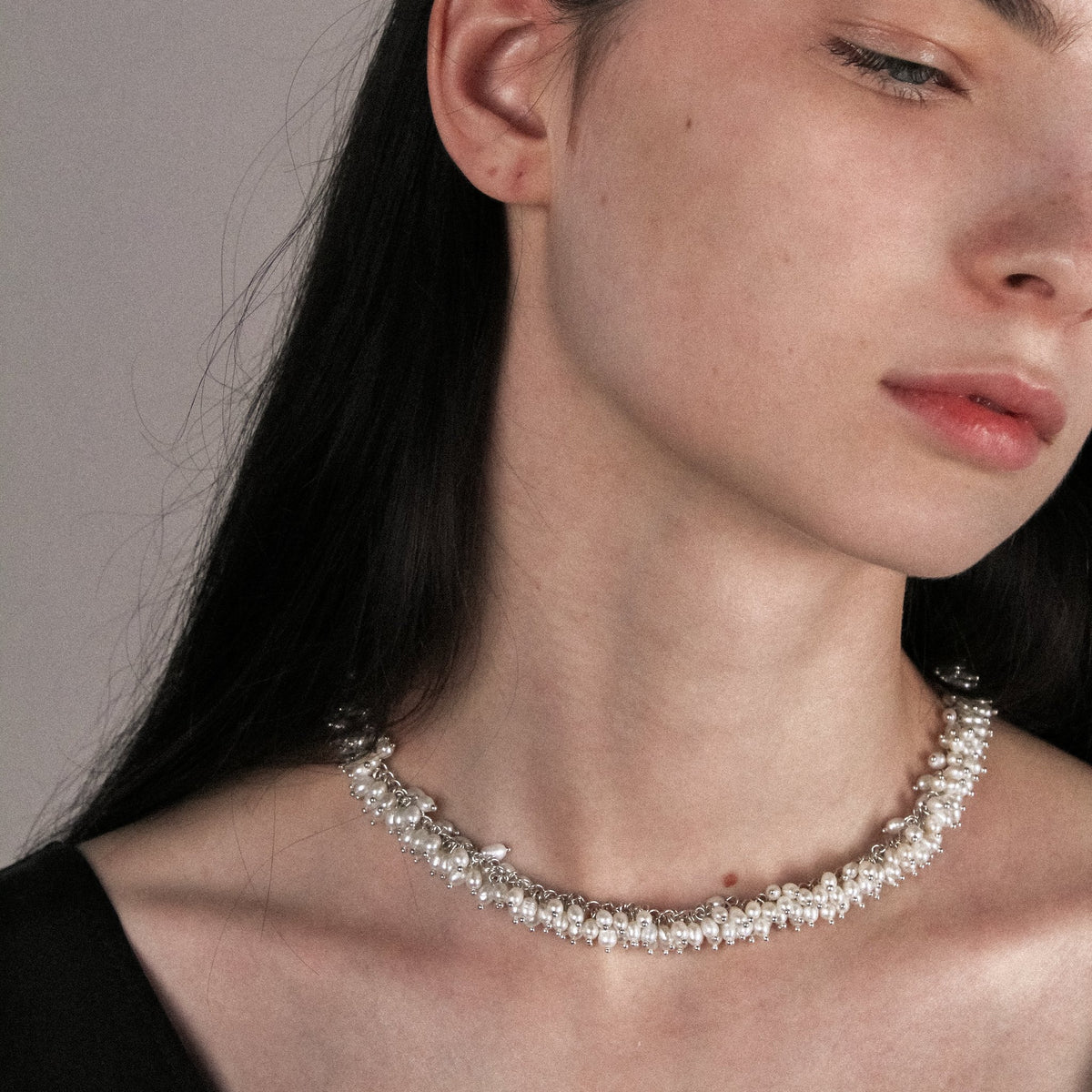 Lupine handmade silver necklace featuring natural pearls